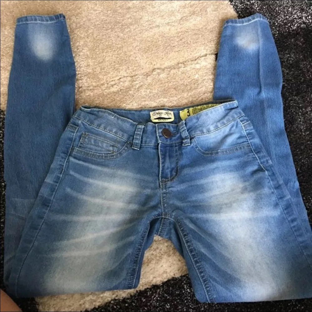 INDIGO REIN LOW RISE JEANS